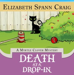 Cover features a black cat near a bloody croquet mallet and ball. 